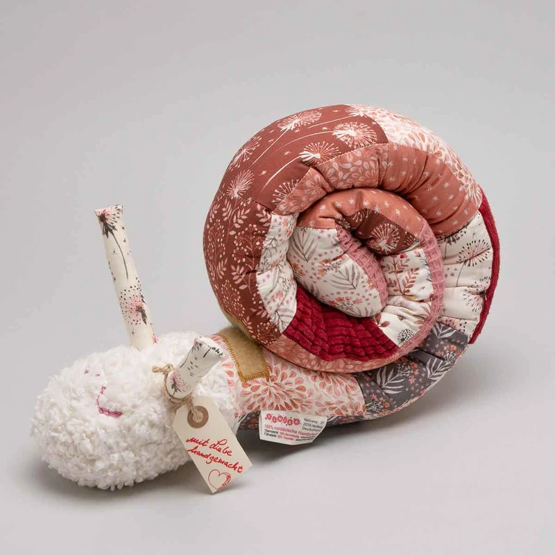 Tinéba Kuschelschnecke Pusteblume rost